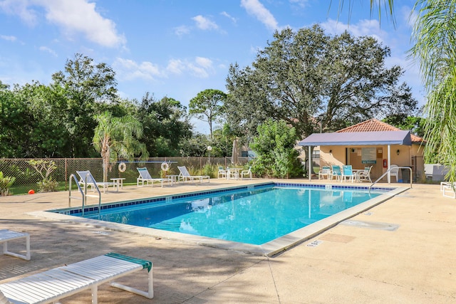 view of pool with a patio