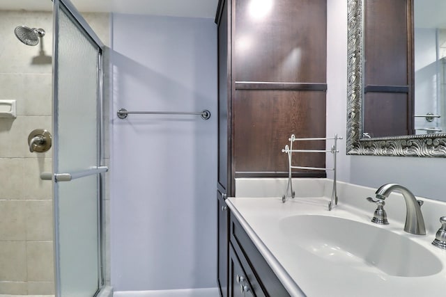 bathroom featuring vanity and walk in shower