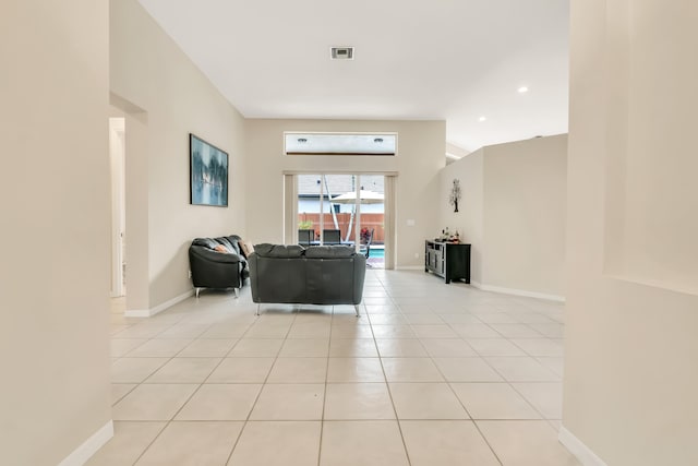 living room with light tile patterned flooring