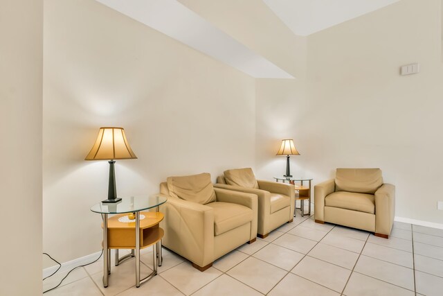 sitting room featuring light tile patterned flooring