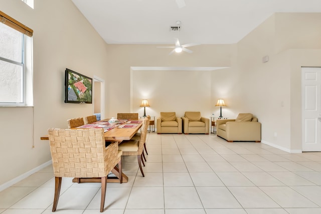 dining area featuring ceiling fan and light tile patterned floors