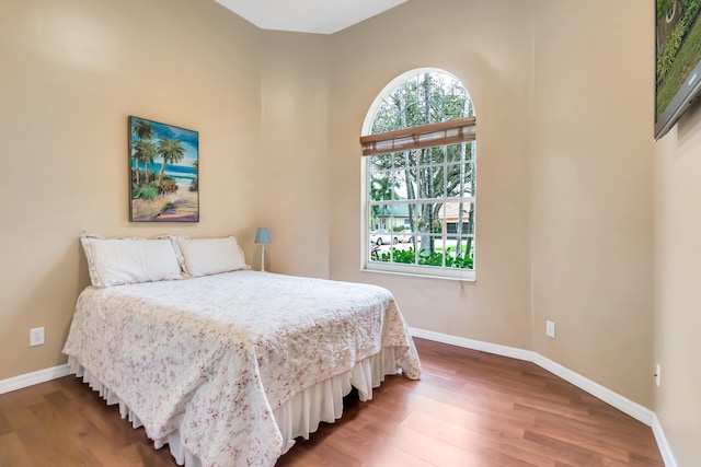 bedroom featuring hardwood / wood-style flooring