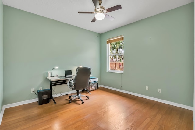 office featuring ceiling fan and wood-type flooring