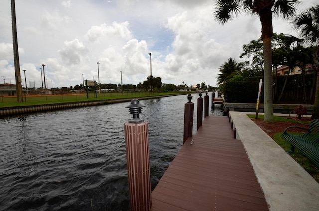 dock area featuring a water view