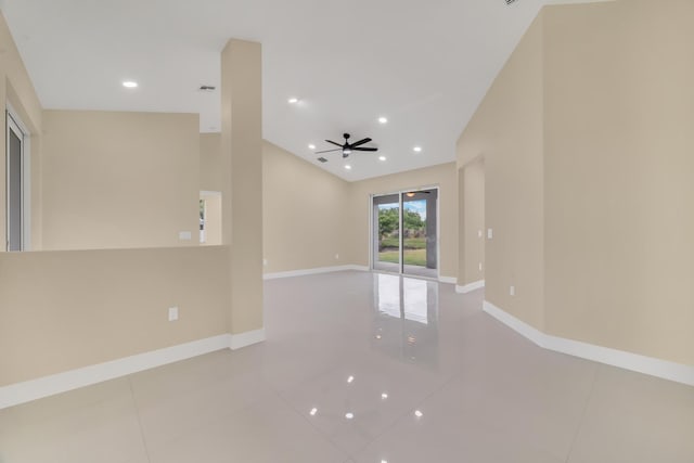 tiled empty room featuring ceiling fan