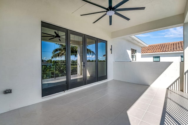 view of patio with ceiling fan