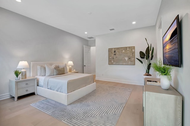 bedroom with light wood-type flooring