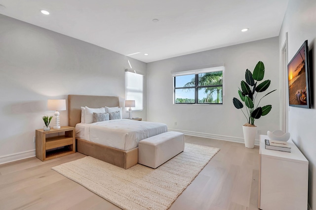 bedroom featuring light wood-type flooring