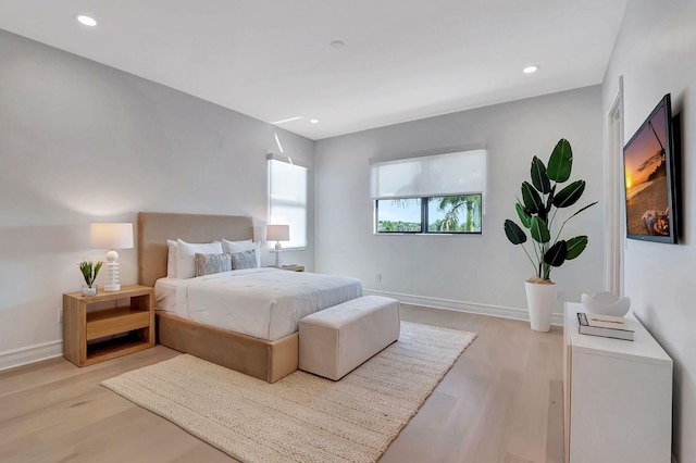 bedroom with light hardwood / wood-style flooring