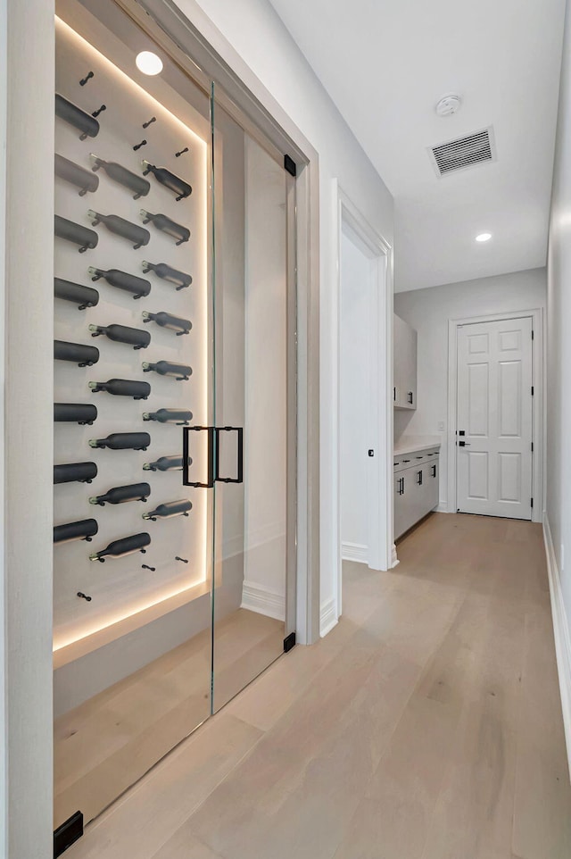 hallway featuring light hardwood / wood-style flooring