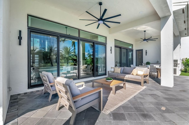 view of patio with ceiling fan and an outdoor hangout area