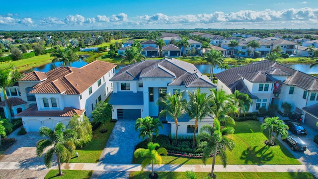 bird's eye view with a water view