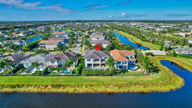 drone / aerial view with a water view