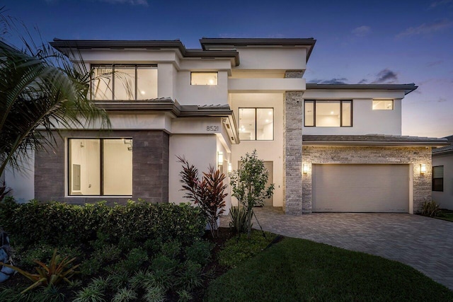 view of front of home with a garage