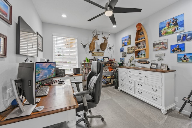 office area with ceiling fan and light colored carpet