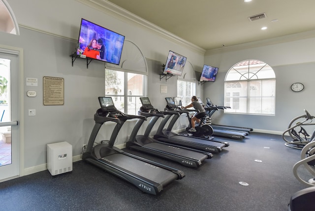 workout area with crown molding