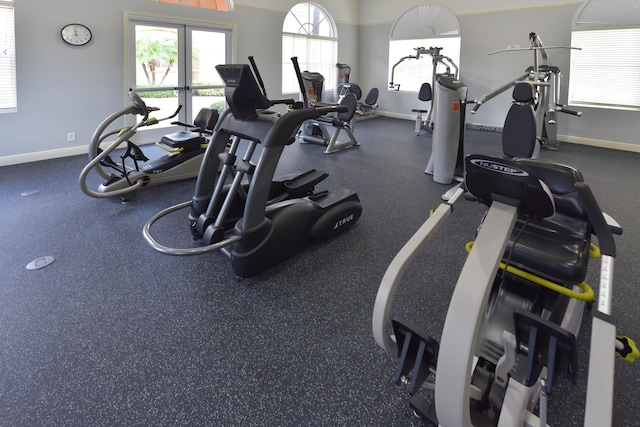 gym featuring french doors