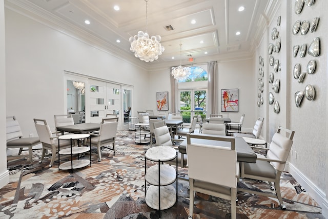 dining room featuring french doors, crown molding, and a chandelier