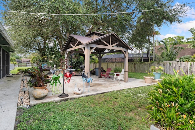 view of yard featuring a gazebo and a patio