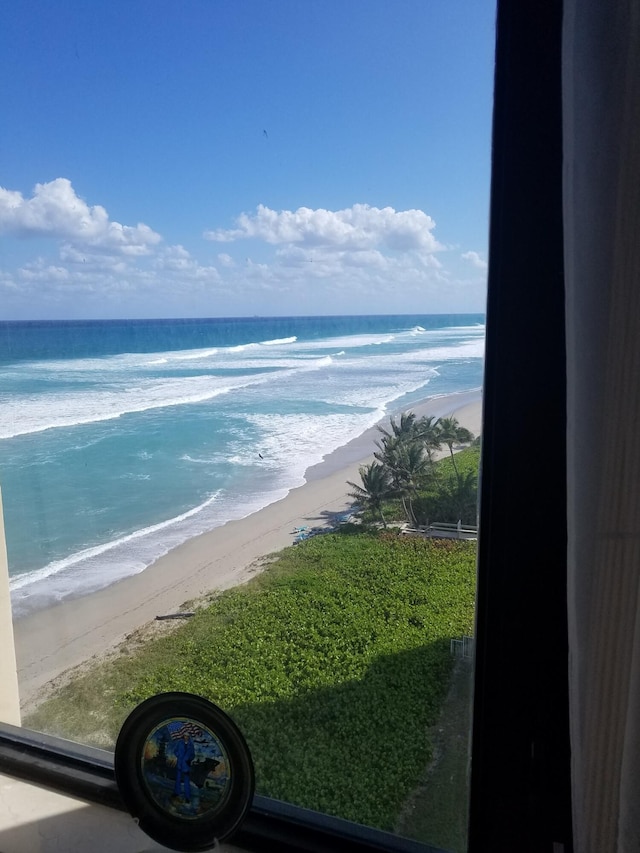 view of water feature with a beach view