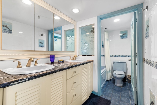 3009 S Ocean Blvd Unit 901, Highland Beach, FL 33487 - bathroom with double vanity, tub / shower combination, tile walls, toilet, and tile patterned flooring