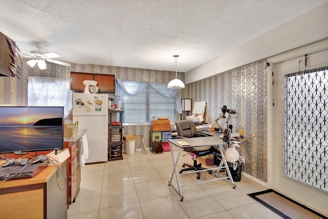 kitchen featuring pendant lighting, white refrigerator, a wealth of natural light, and ceiling fan