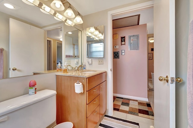 bathroom with tile patterned floors and vanity