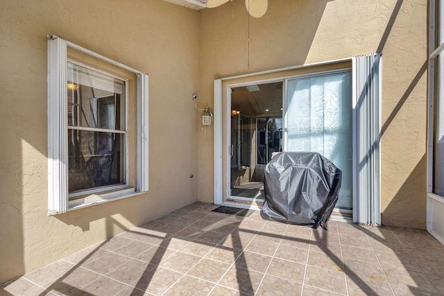 doorway to property featuring a patio