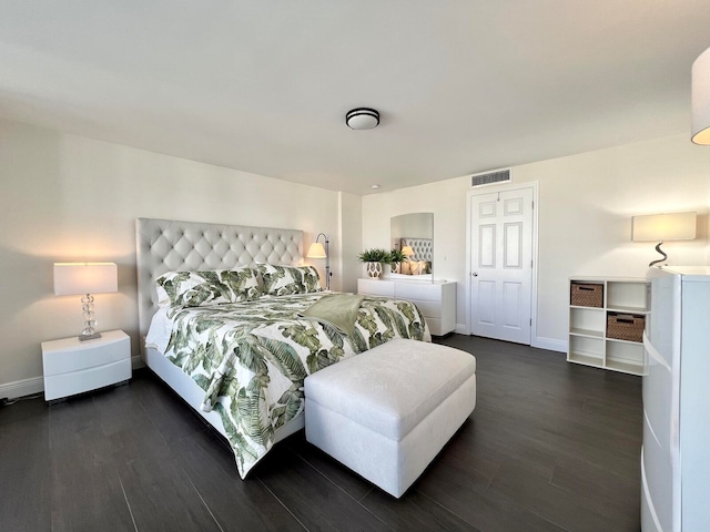 bedroom featuring dark hardwood / wood-style floors