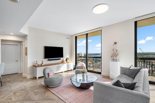 living room featuring light parquet flooring