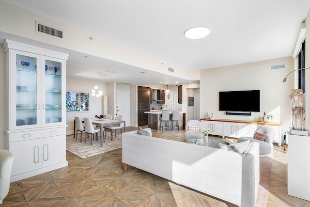 living room with light parquet floors