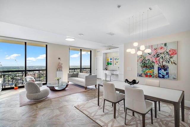 dining area with light parquet flooring