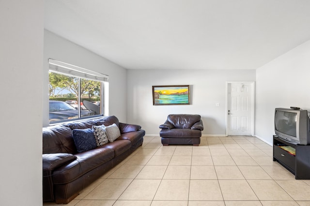 living room with light tile patterned flooring