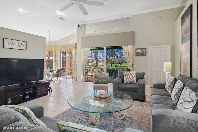 living room with high vaulted ceiling, light tile patterned floors, ceiling fan, and crown molding