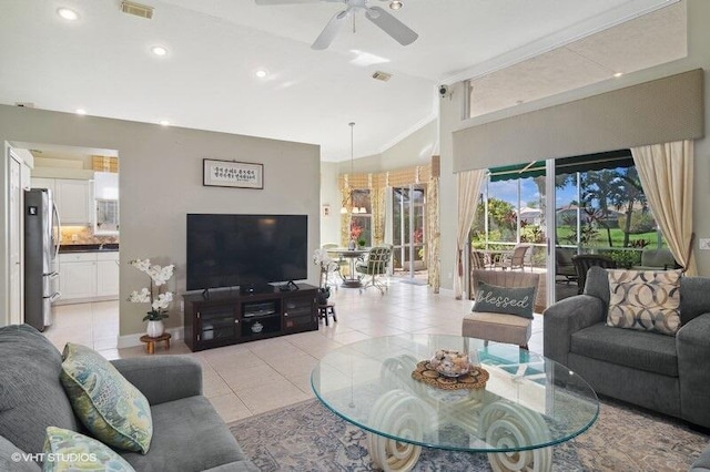 tiled living room featuring ornamental molding and ceiling fan