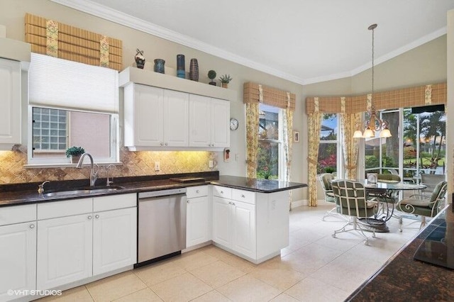 kitchen with white cabinets, hanging light fixtures, a chandelier, sink, and stainless steel dishwasher