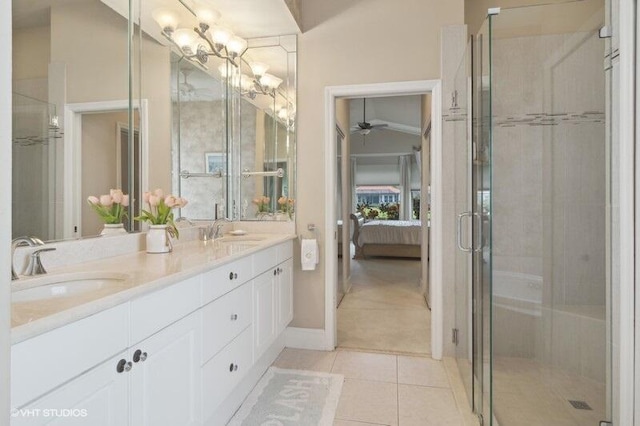 bathroom featuring walk in shower, vanity, tile patterned flooring, lofted ceiling, and ceiling fan