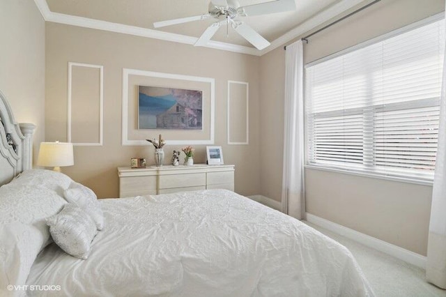 bedroom featuring carpet flooring, ceiling fan, and crown molding