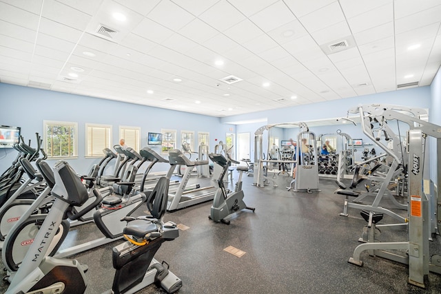 workout area featuring recessed lighting, visible vents, and a paneled ceiling