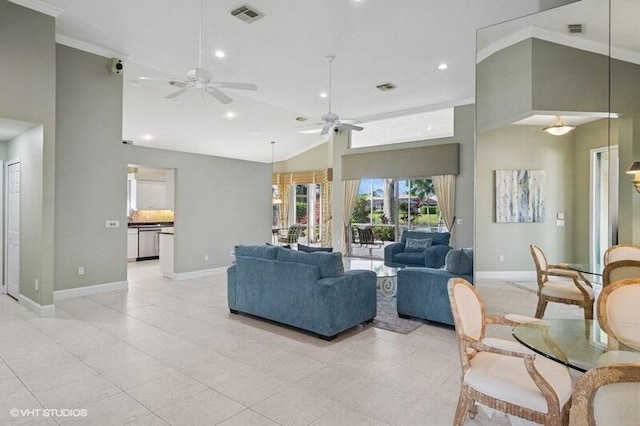 living area featuring visible vents, baseboards, and high vaulted ceiling