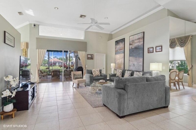 tiled living room featuring high vaulted ceiling, ornamental molding, and ceiling fan