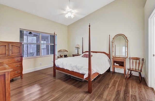 bedroom featuring dark hardwood / wood-style flooring and ceiling fan