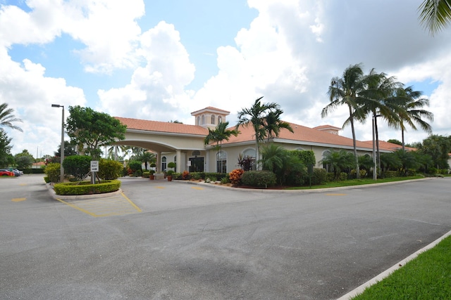 view of building exterior featuring a carport