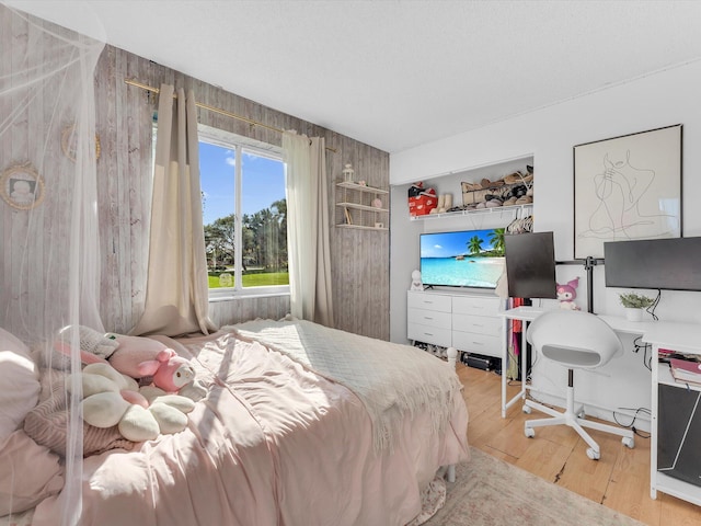 bedroom featuring light hardwood / wood-style floors