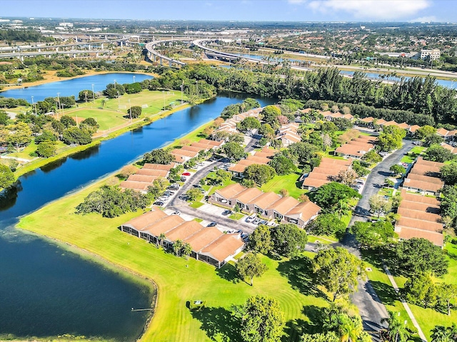 drone / aerial view with a water view