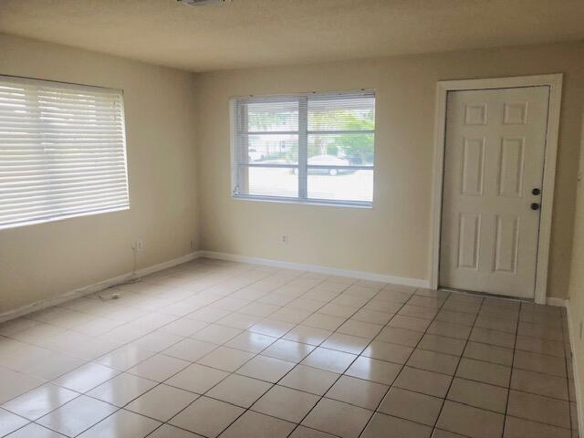 view of tiled spare room