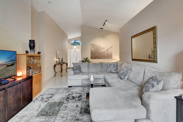 tiled living room featuring lofted ceiling