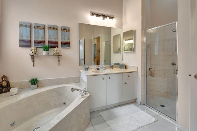 bathroom with tile patterned floors, vanity, and plus walk in shower