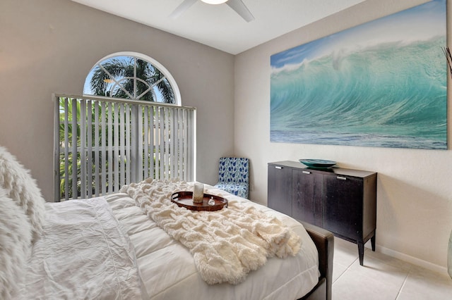 tiled bedroom with ceiling fan