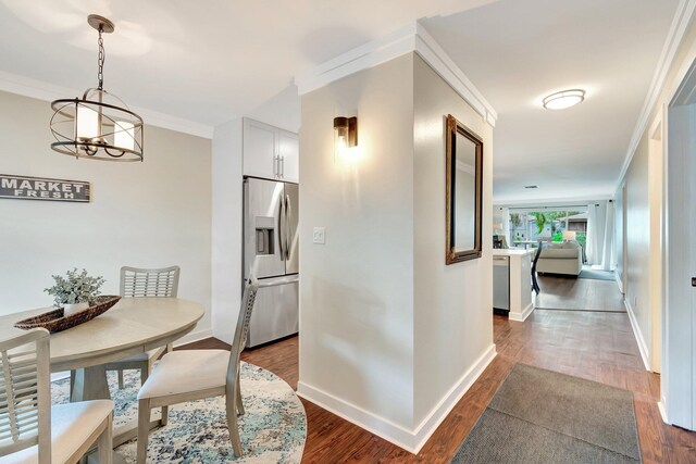 sunroom featuring ceiling fan